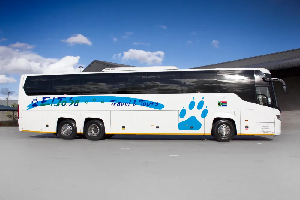 An ElJoSa coach photographed side-on, showing the full livery